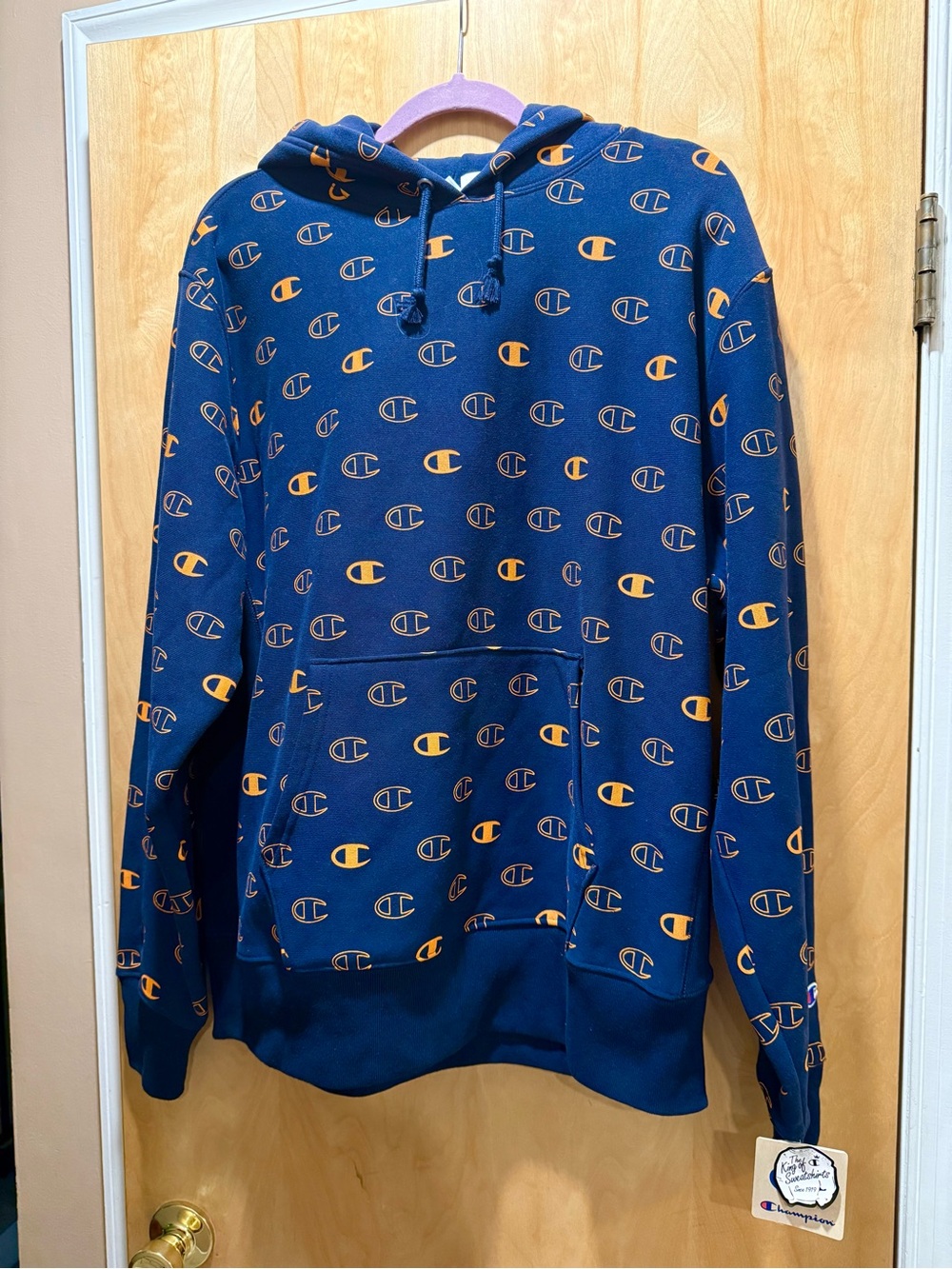 Champion Navy Hoodie Sweatshirt with Orange Allover Logo